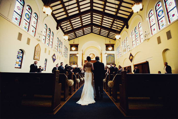 Bride walking down the aisle at Old First Presbyterian Church by San Francisco wedding photographer Tinywater Photography