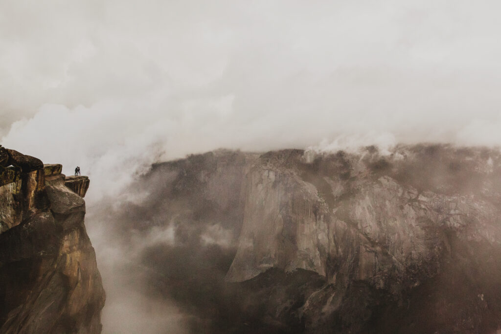 Best Elopement Locations in northern california in Yosemite. Bride and Groom on cliff