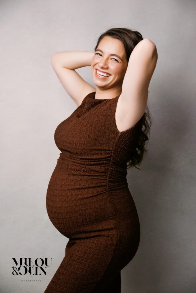 Editorial maternity portrait showing pregnancy silhouette