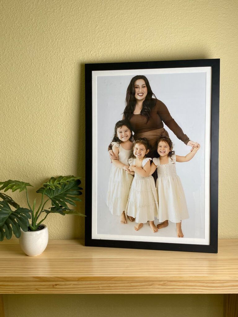 Framed family portrait displayed in living room