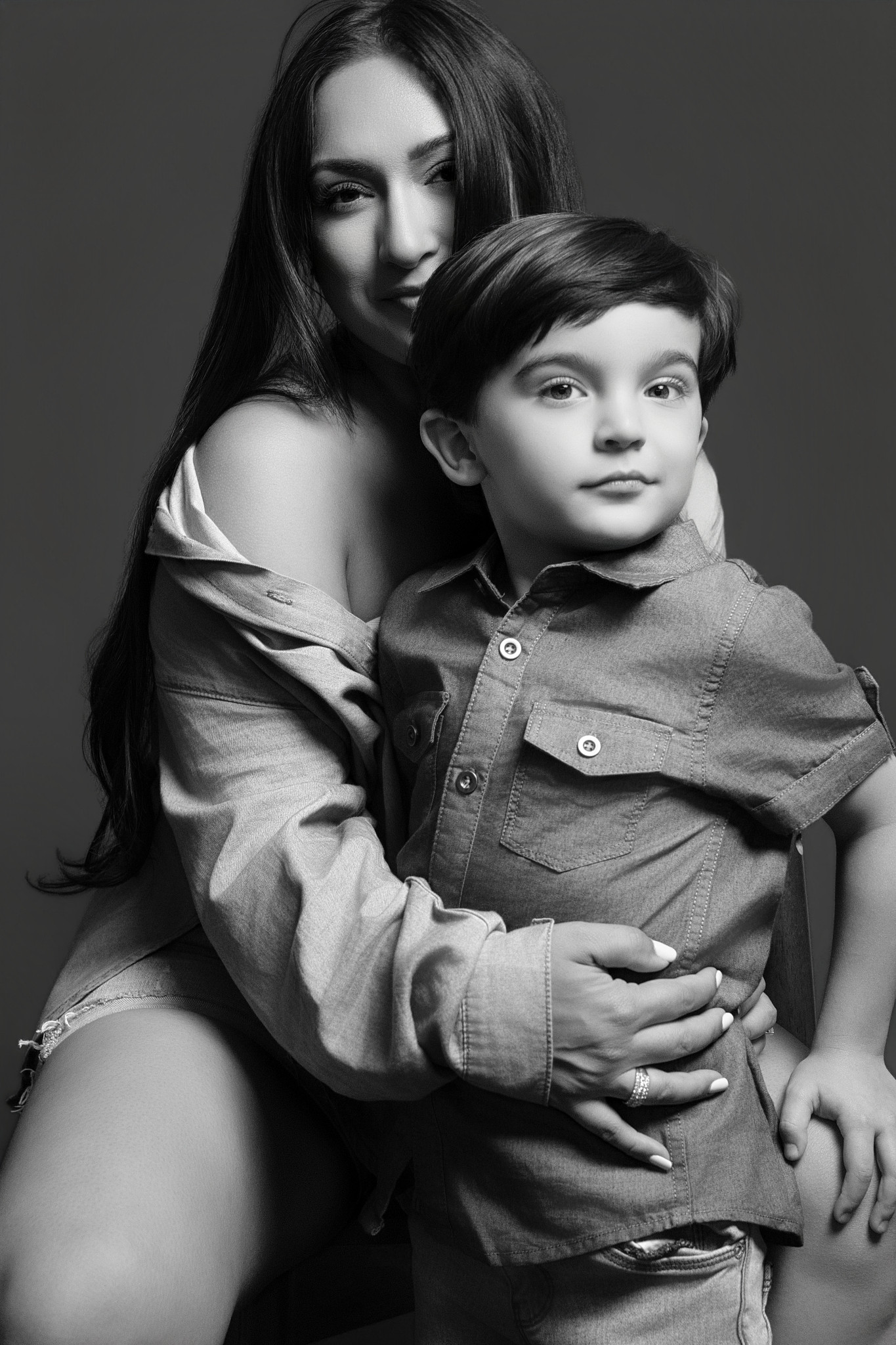 Fine-art motherhood portrait at Milou & Olin's Sacramento studio — a mother and two children